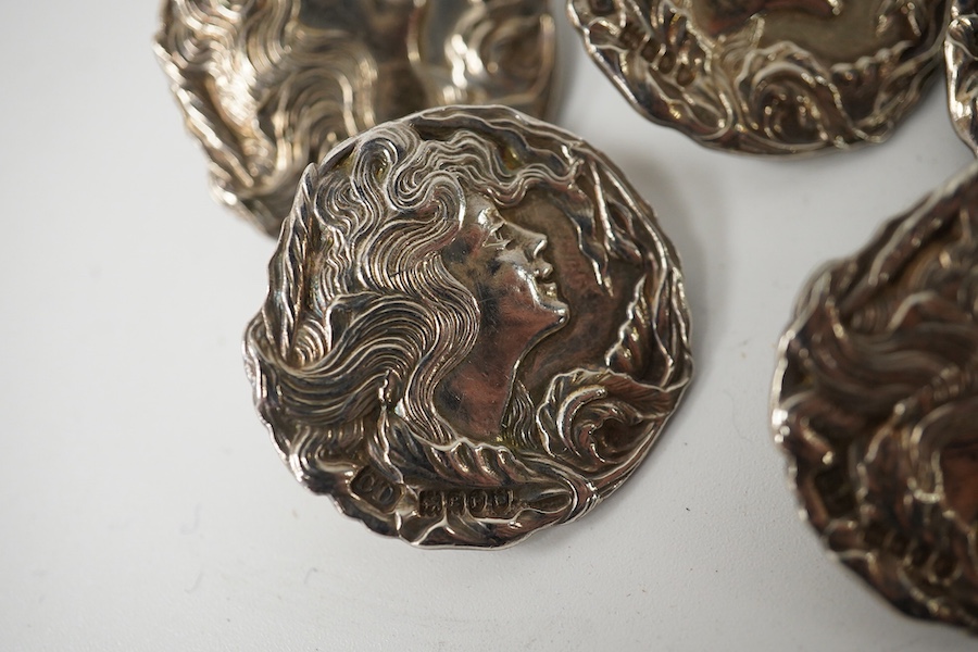 A set of 5 Edwardian Art Nouveau imported silver buttons decorated with maidens heads, Charles Henry Dumenil, London 1904, 28mm. Condition - good